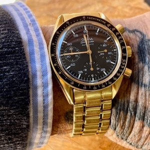 Omega speedmaster reduced gold hotsell