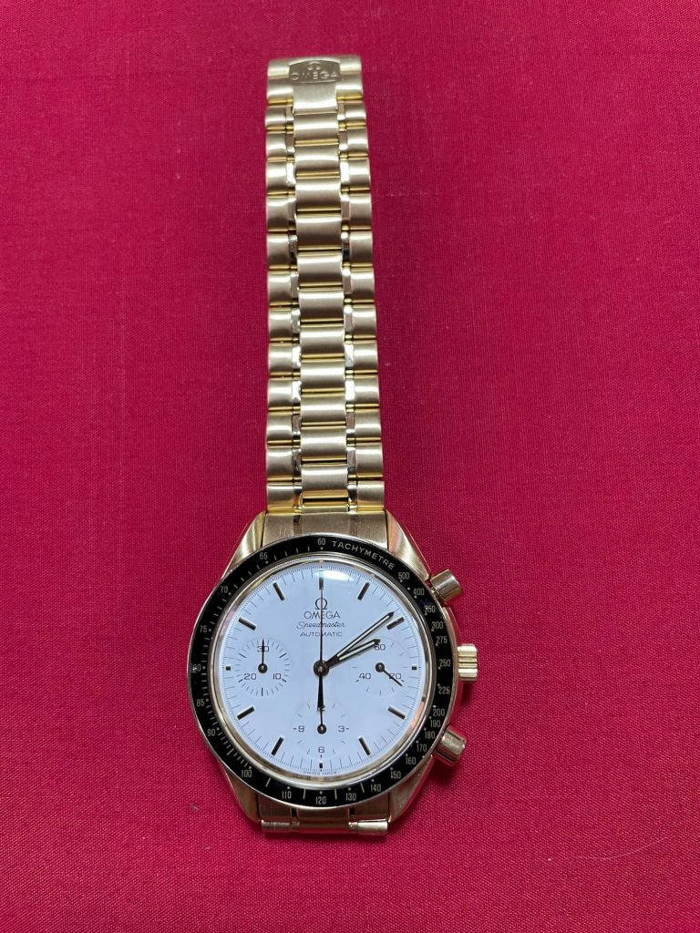 omega speedmaster reduced 18k gold